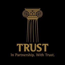 TRUST Group logo